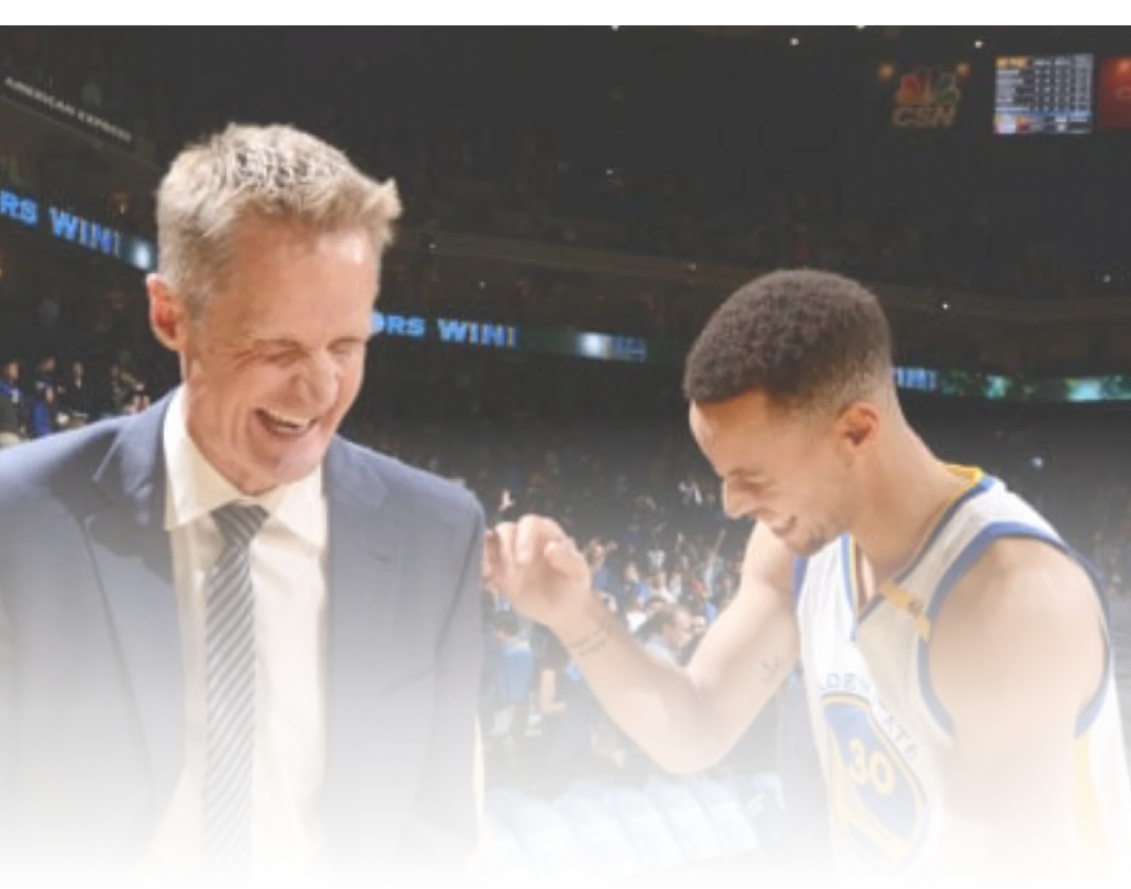 Basketball coach with player
